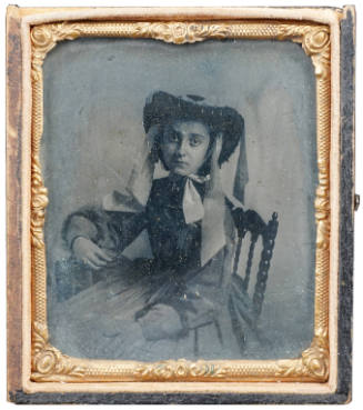 Seated Young Woman in a Hat with Streamers