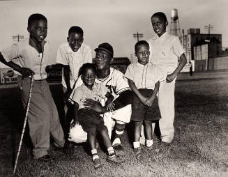 Satchel Paige with the Withers Children