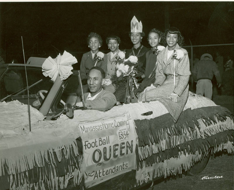 Manassas High School's Queen Barbara Harrison is Seen Seated with her Attendants