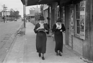 Two Women Walking Along the Street, Natchez, Mississippi