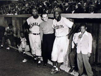 Ernie Banks, Larry Doby, Matty Brusher, and Jackie Robinson, with a Young Fan, Martin's Stadium, Memphis