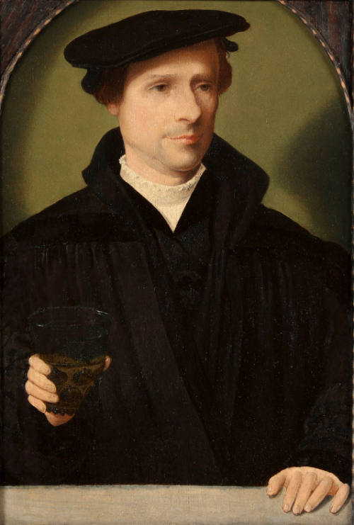 Portrait of a Young Man Holding a Glass