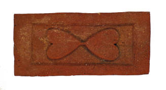 Brick Imprinted with Apotropaic Symbols (Double Hearts)
