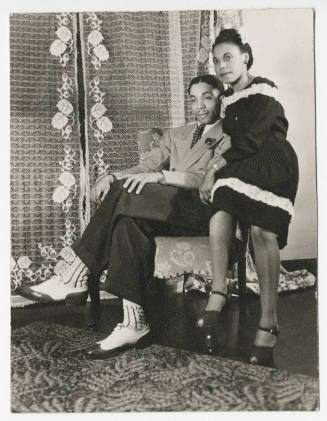 [Young couple seated, Chicago]