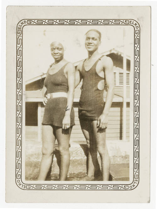 [Man and woman wearing swimsuits]