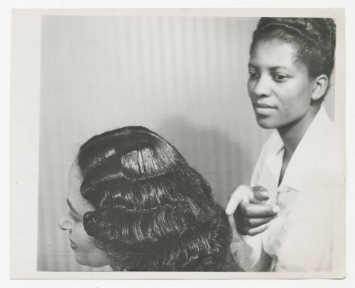 [Two women, one showing hairstyle, Denver]