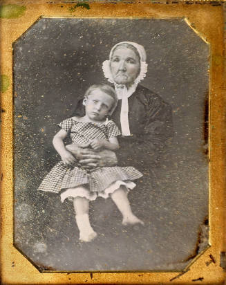 Woman and Child with Bandaged Foot