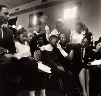 Mrs. Medgar Evers Comforts her Eldest Son at her Husband's Funeral, Jackson, Mississippi