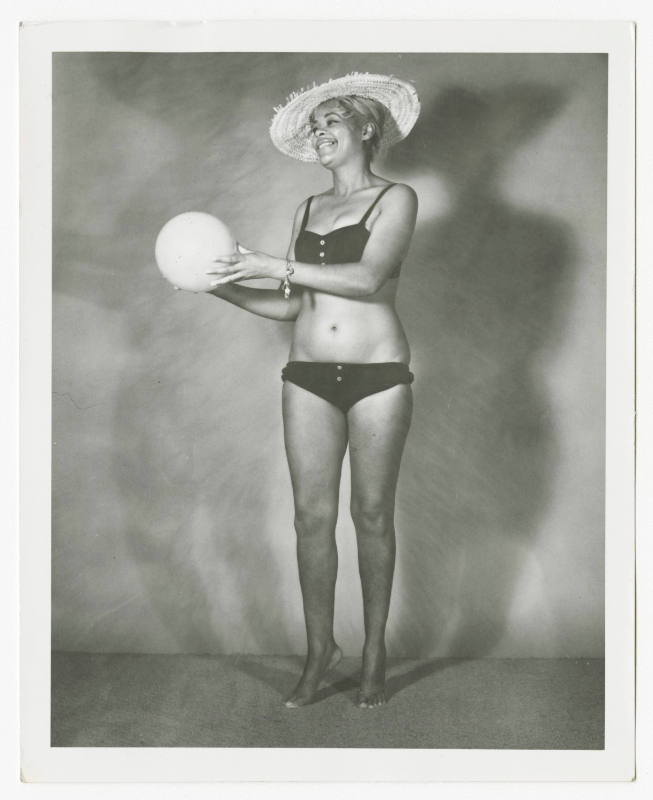 [Woman wearing swimsuit in studio]