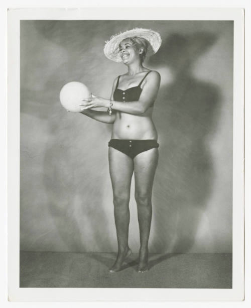 [Woman wearing swimsuit in studio]