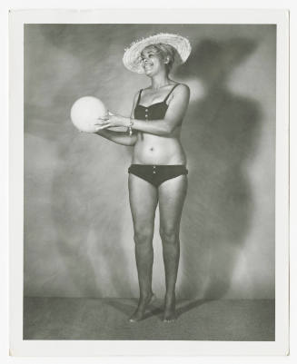 [Woman wearing swimsuit in studio]