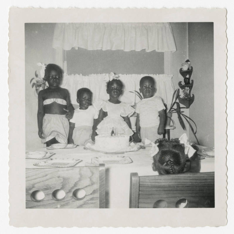 [Group of children at a birthday party]