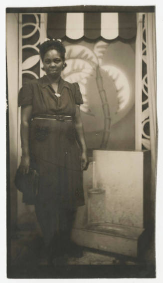 [Woman standing in studio]
